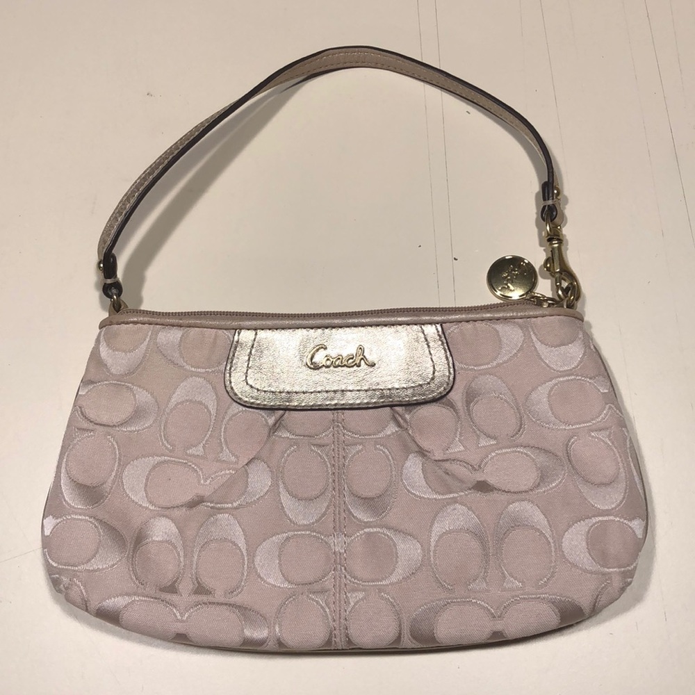 Small coach hand bag 9 1/2 x 5 1/2 tan